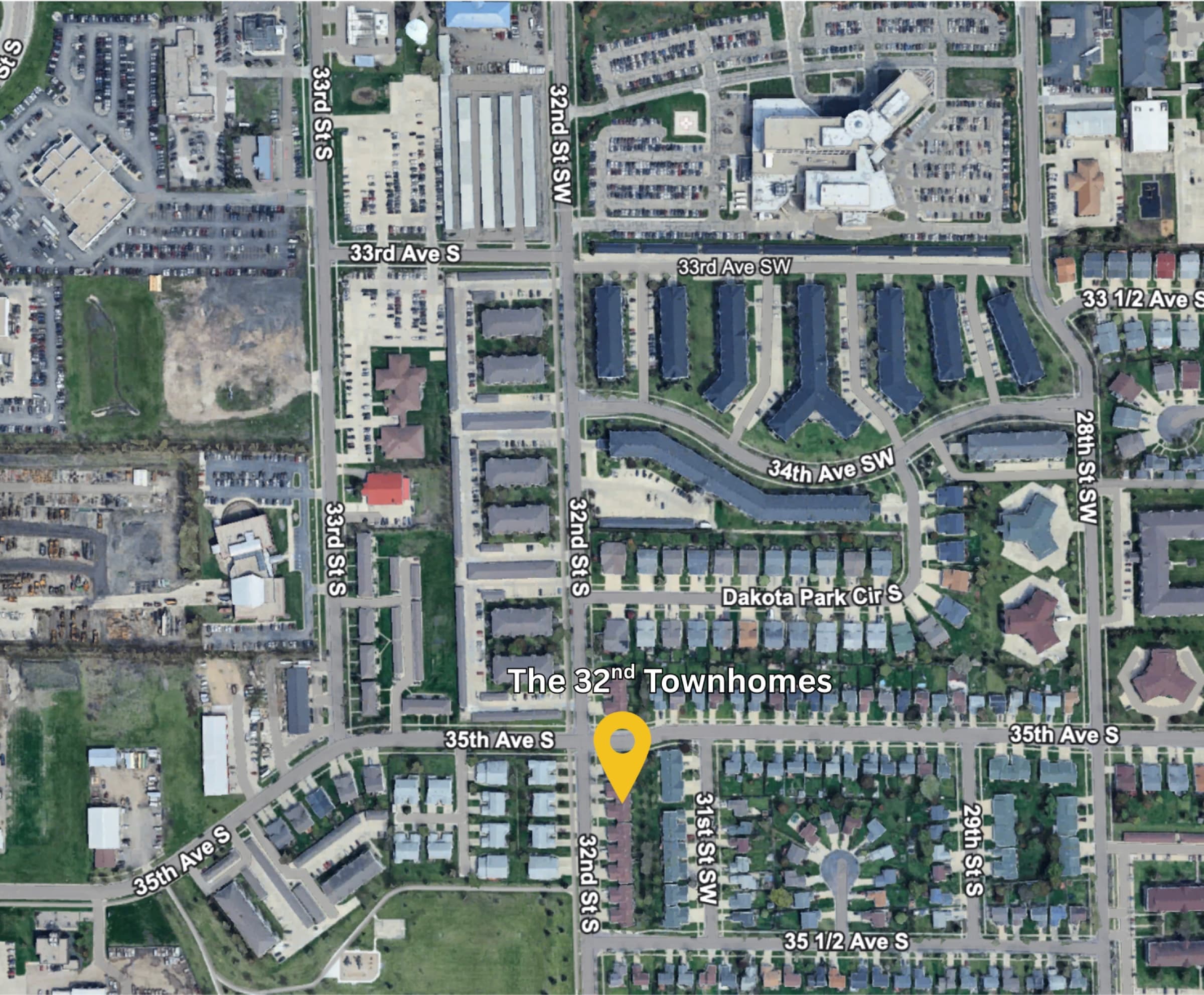Drone view of 32nd Street Townhomes, property outlined