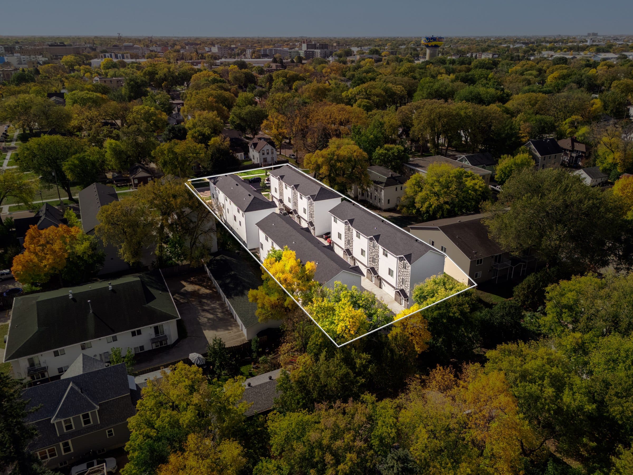 Drone view of The Roosevelt Townhomes, property outlined